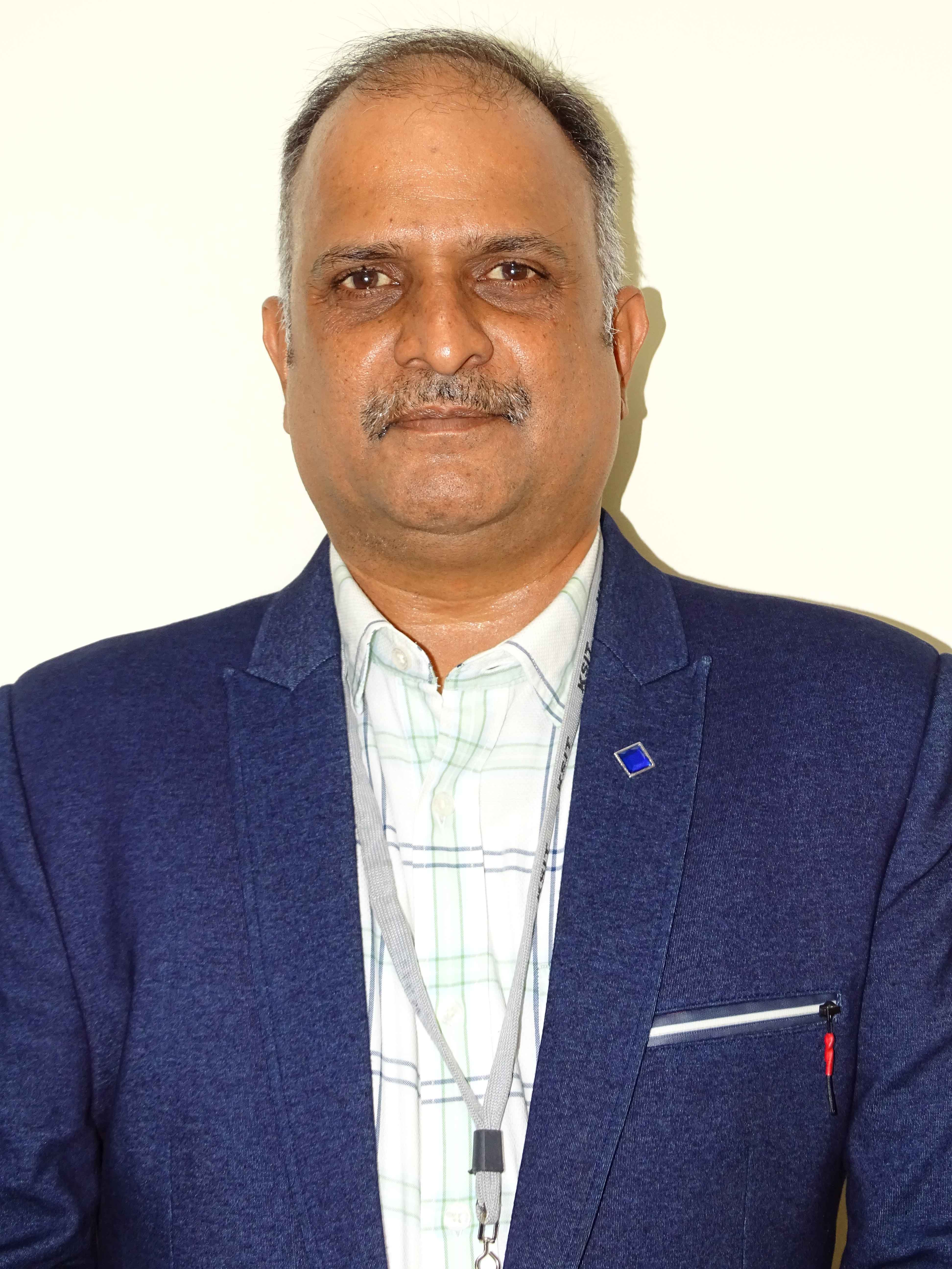 Dr.GIRISH T R