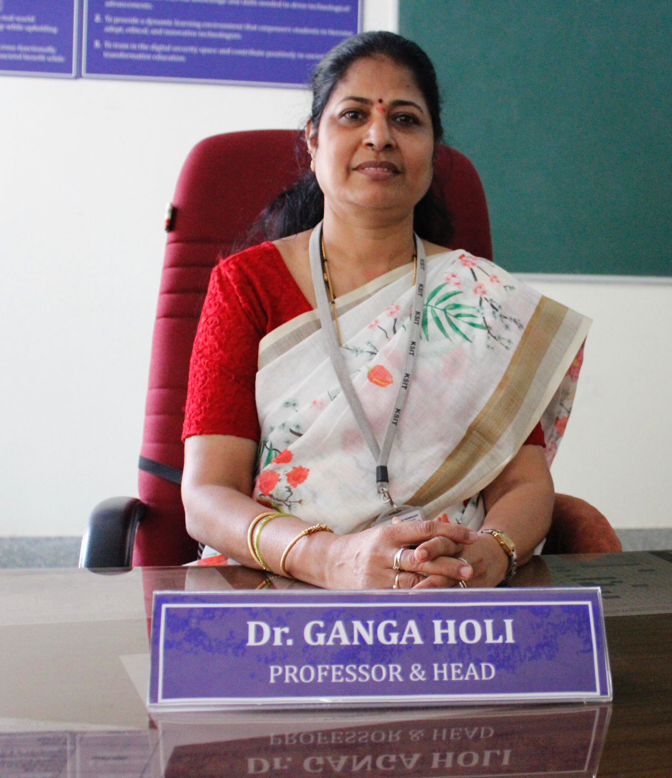 Dr GANGA HOLI